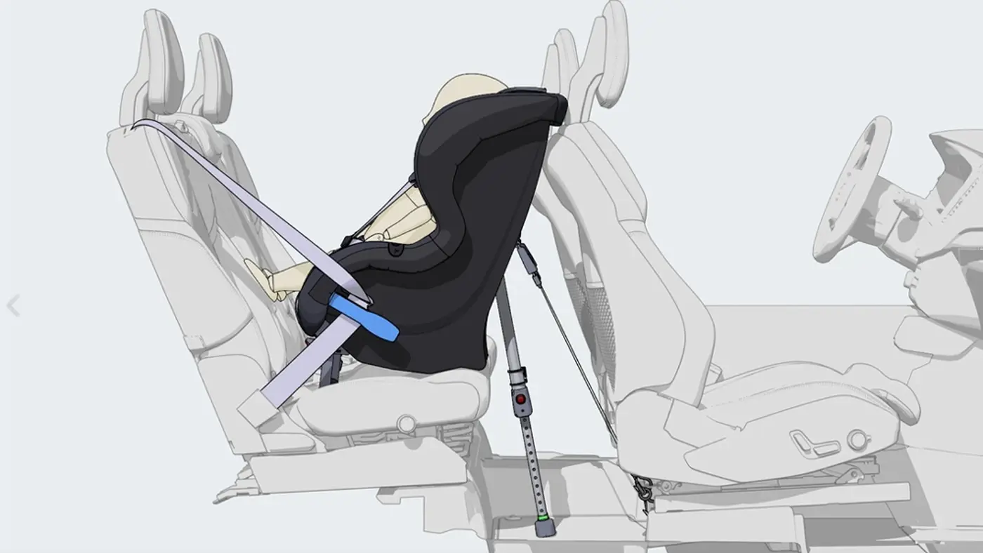 En illustration av en bakåtvänd bilbarnstol i en bil.